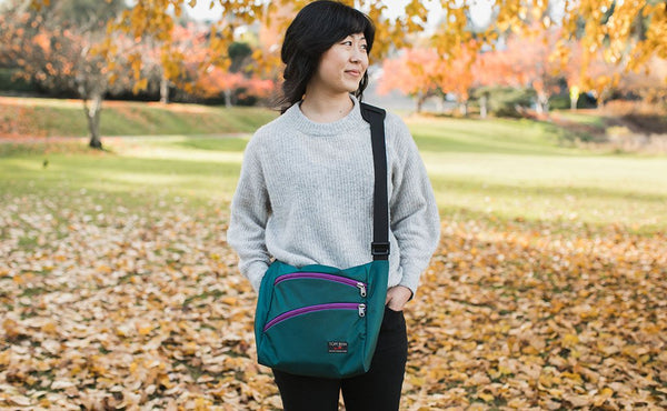 A person carrying an Icon cross-body.